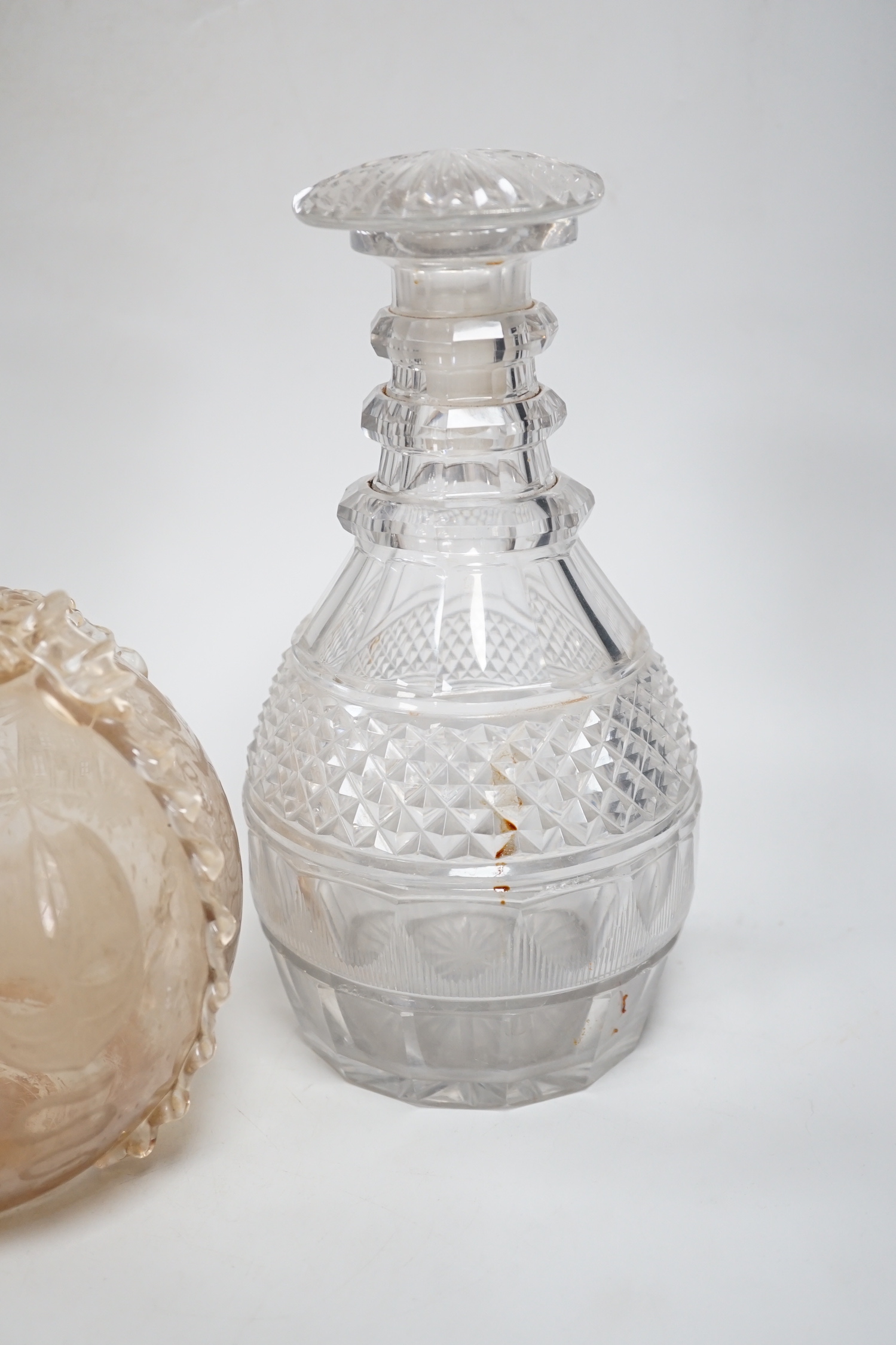 Two Dutch wheel engraved glass flasks and two Regency cut glass decanters, flasks 23cm high (4)